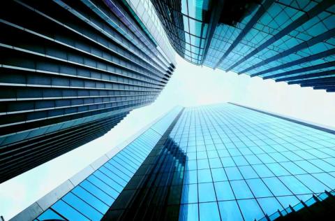 Looking up at skyscrapers
