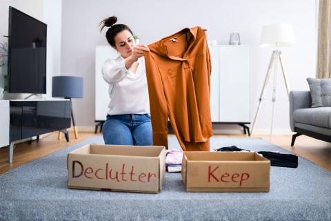 Woman sorting clothes